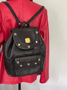 Vintage MCM Black Leather Visetos Logo Backpack with Gold Accents